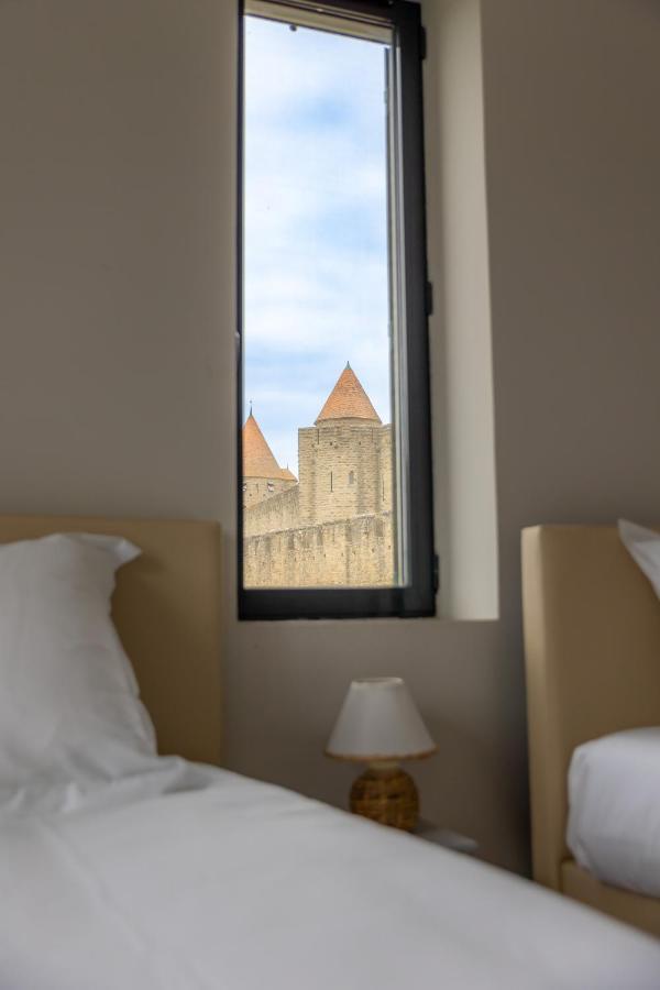 Sous Les Remparts La Maison Pimprenelle Carcassonne Exterior photo